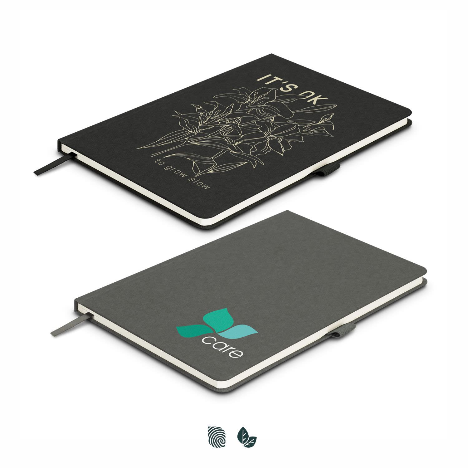 A black Petros Stone Paper Notebook with a design and a logo on the cover, featuring a ribbon bookmark. Petros Stone Paper Notebook - Image 1