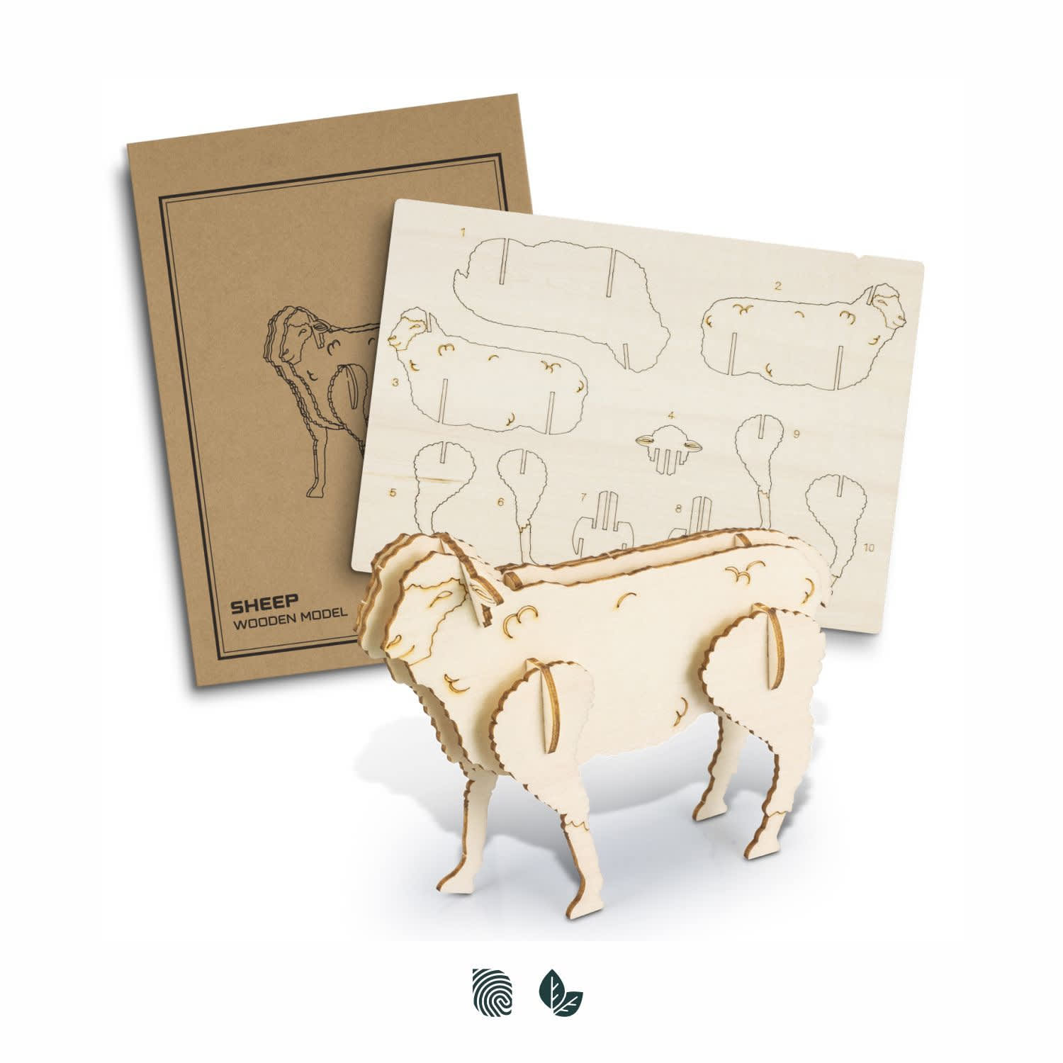 A wooden sheep model in natural wood colour with assembly instructions on a cardboard background. BRANDCRAFT Sheep Wooden Model - Image 1