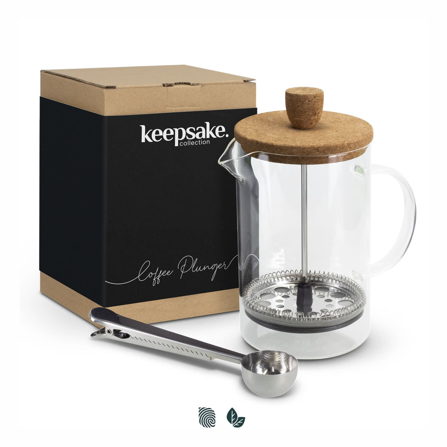 A transparent coffee plunger with a cork lid and stainless steel components, packaged in a branded box alongside a measuring spoon. Keepsake Onsen Coffee Plunger - Image 1