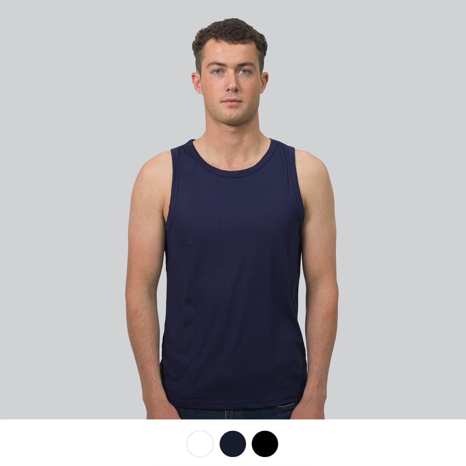 A navy blue men's sports tank top displayed on a model with options for white and black below. TRENDSWEAR Agility Mens Sports Tank Top - Image 1