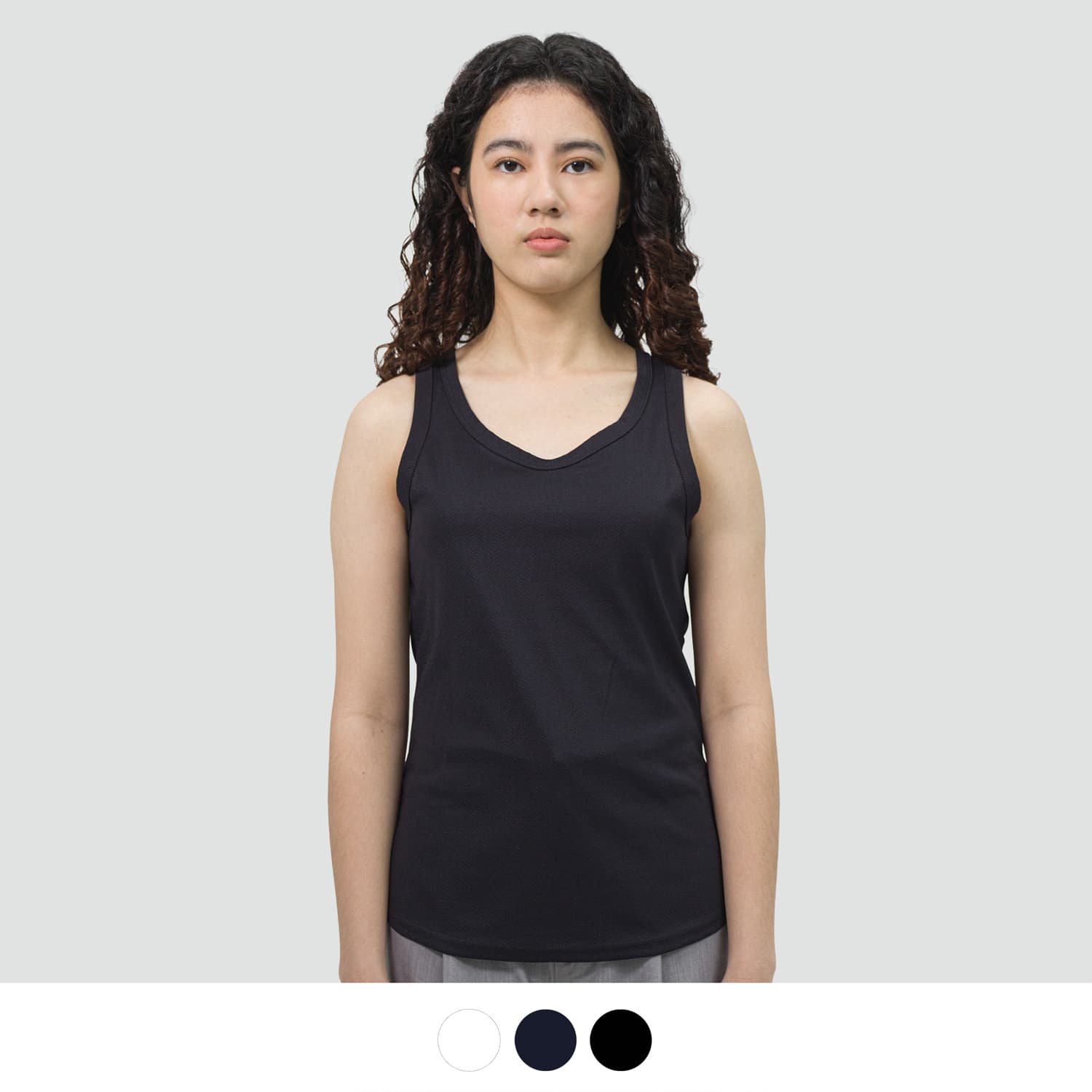 A black women's sports tank top with a scoop neckline and a slim fit, featuring a logo. TRENDSWEAR Agility Womens Sports Tank Top - Image 1