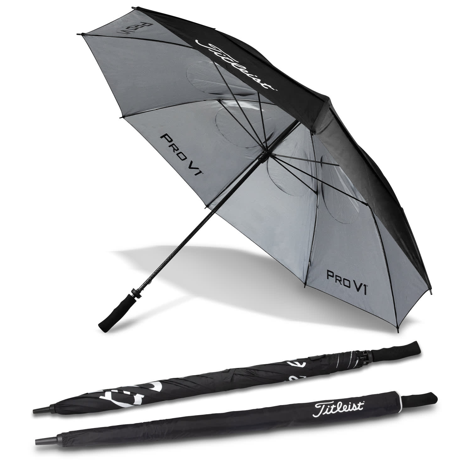 A black and grey double canopy golf umbrella featuring a handle and an umbrella cover, with branding. Titleist Tour Double Canopy Umbrella - Image 1