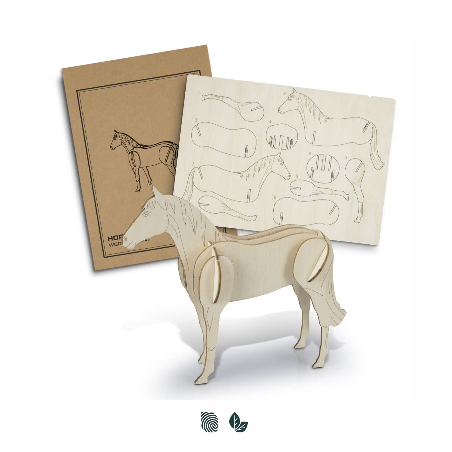 A wooden horse model kit with a light natural finish and assembly instructions in the background. BRANDCRAFT Horse Wooden Model - Image 1