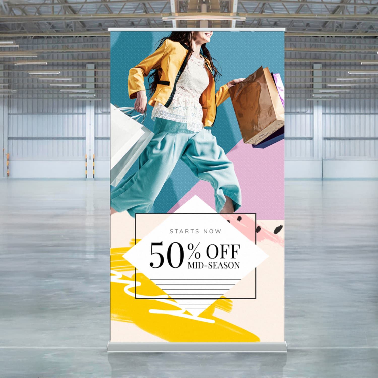 A promotional pull-up banner featuring vibrant pastel colours and an image of a person carrying shopping bags. Luxury Pull Up Banner Wide - Image 1