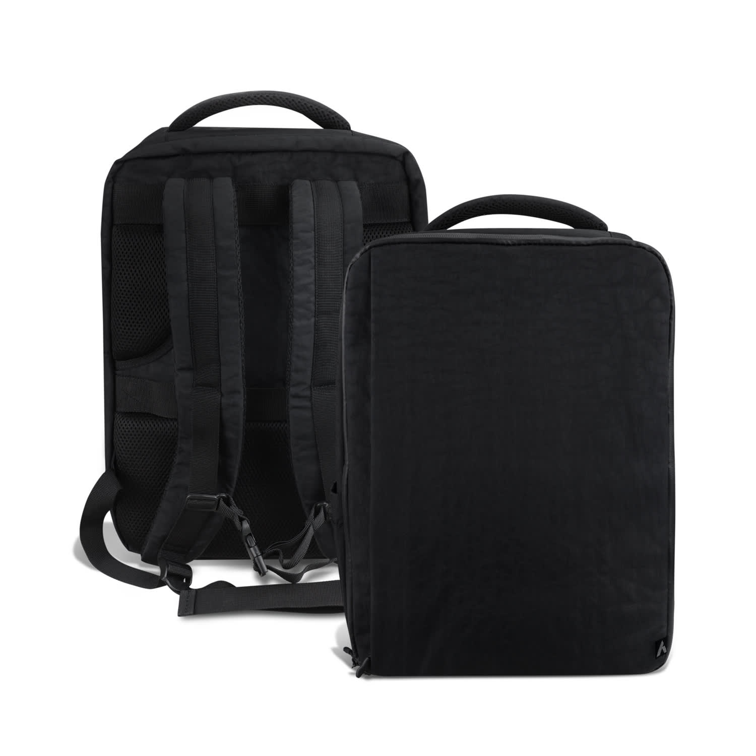A black travel backpack featuring adjustable straps, a top handle, and a sleek design. It includes a logo on the front. ARCHER Tasman Travel Backpack - Image 1