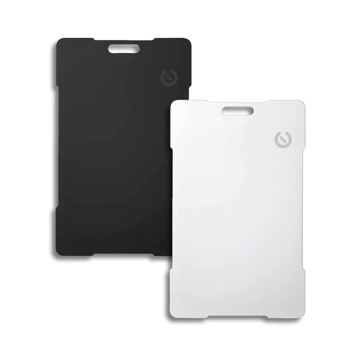 A pair of Bluetooth trackers in black and white, featuring a logo on each. Carbon Bluetooth Tracker - Image 1