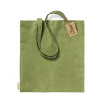 A green canvas bag with a shoulder strap and a hangtag featuring a logo. The fabric has a textured appearance.