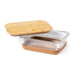A glass lunch box with a bamboo lid and a cork base. It features a transparent design and is rectangular in shape.