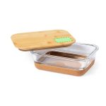 A glass lunch box with a cork base and a bamboo lid, featuring a rectangular shape and transparent design.
