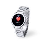 A silver smart watch with a round face displaying a heart rate reading. It has a metallic bracelet design.