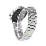 A silver metal watch with a sleek design, featuring a shiny bracelet and a minimalist face. It has a logo on the back.