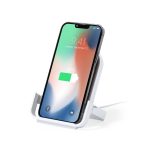 A wireless charger in white, designed to hold a smartphone while it charges, featuring a sleek stand.