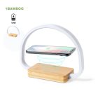 A wireless charger lamp with a white arch shape and a bamboo base, designed to charge devices wirelessly.