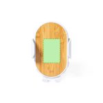 A wireless charger holder with a wooden bamboo surface and white edges, featuring a central green marking.