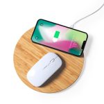 A wireless charger mousepad in a round bamboo design, featuring a white mouse and a smartphone charging.