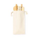 A cream-coloured pouch containing wooden utensils for sushi, including chopsticks and a sushi mat, with a drawstring closure.