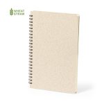 A spiral-bound notebook in a light beige colour, made from wheat straw materials, featuring a logo on the top left.