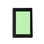 A black spiral notebook with a textured cover and a green blank area on the front. Branding is present.