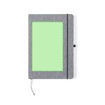 A grey notepad with a textured cover and a green rectangular section, featuring an elastic closure and ribbon bookmark.