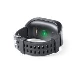 A black smartwatch with a green indicator on the back and a flexible strap, featuring a logo.