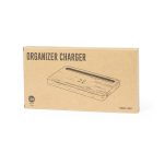 A wooden and cardboard box containing a wireless charger, featuring a sleek, minimalist design. It has a branding logo.