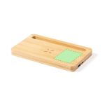 A bamboo wireless charger with a slot for devices and a green highlighted area. Features a branding logo.