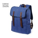 A blue canvas backpack featuring brown leatherette straps and a flap closure, with side pockets and branding visible.