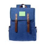 A blue backpack with brown leather straps and a plain area on the front for a logo or name.