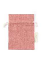 A red drawstring bag made of recycled cotton, featuring a natural twine closure and a small tag.