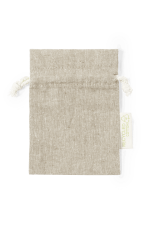 A beige drawstring bag made from recycled cotton, featuring a small logo tag.