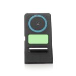 A black wireless charger featuring a circular charging area and a slot for a phone stand.