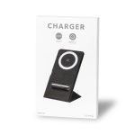 A wireless charger in black fabric finish, presented on a white packaging with a stand for easy use.