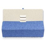 A blue and beige notebook with a textured cover and spiral binding, featuring decorative buttons on the front.