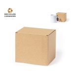 A brown cardboard gift box, made from recycled materials, with a smaller box and a white mug beside it.