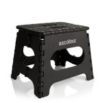 A black utility stool with a textured surface and cut-out handles, featuring a brand logo.