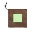 A brown pouch with a drawstring closure and a light green square patch in the centre.