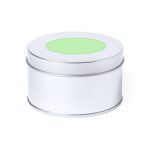 A silver tin container with a smooth, circular lid featuring a green dot in the centre. It has a simple design and branding.