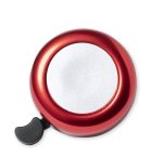A red bike bell with a shiny silver centre and a black lever.