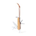 A multifunctional pocket knife with cork handle, featuring a knife, scissors, and corkscrew, attached to a leather strap.