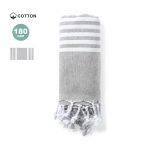 A grey and white striped towel pareo made of cotton, featuring fringed ends. It includes a logo.