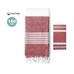 A cotton towel pareo in rust red and white, featuring striped patterns and fringed edges, with a logo present.