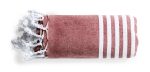 A folded towel pareo in a pinkish-red hue with white stripes and tasselled edges. It features a branding logo.