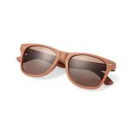 A pair of brown sunglasses with a sleek design and tinted lenses. The sunglasses have a logo on the side.