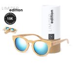 Bamboo sunglasses with blue mirrored lenses, presented in a cylindrical cardboard tube with a logo.