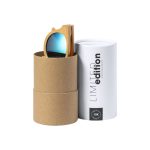 A pair of bamboo sunglasses with mirrored lenses inside a cylindrical packaging. The packaging has a logo.