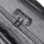 A grey wheeled bag featuring a zipper and a small black device with buttons, likely for security.
