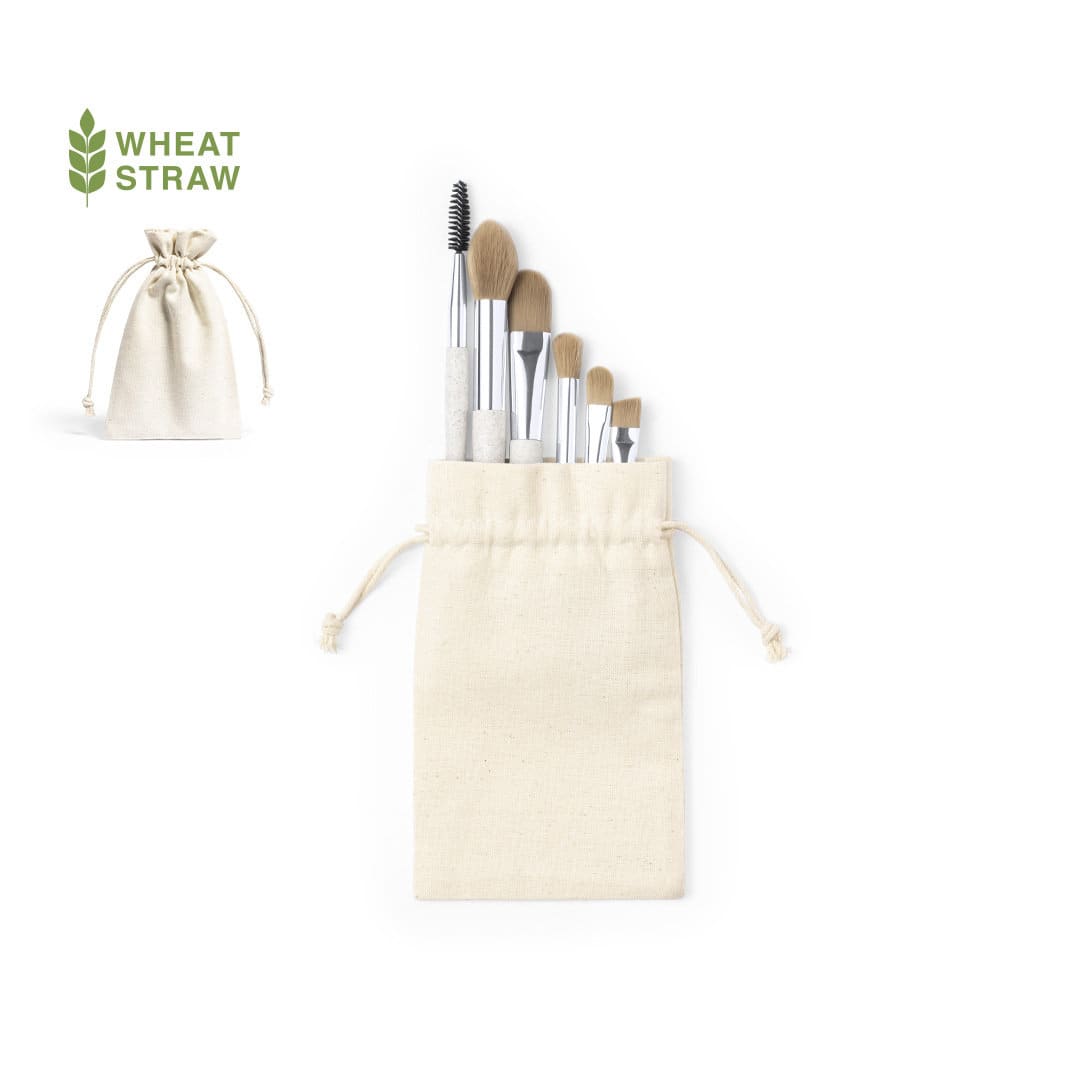 A set of eight eyeshadow applicators in a cream pouch, featuring a mix of brushes and tools for makeup application. A set of eight eyeshadow applicators in a cream pouch, featuring a mix of brushes and tools for makeup application.