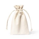 A lightweight, cream-coloured cotton drawstring bag with a gathered top. Contains beauty applicators inside.