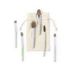A set of five eyeshadow applicators with beige handles, featuring a drawstring pouch for storage.