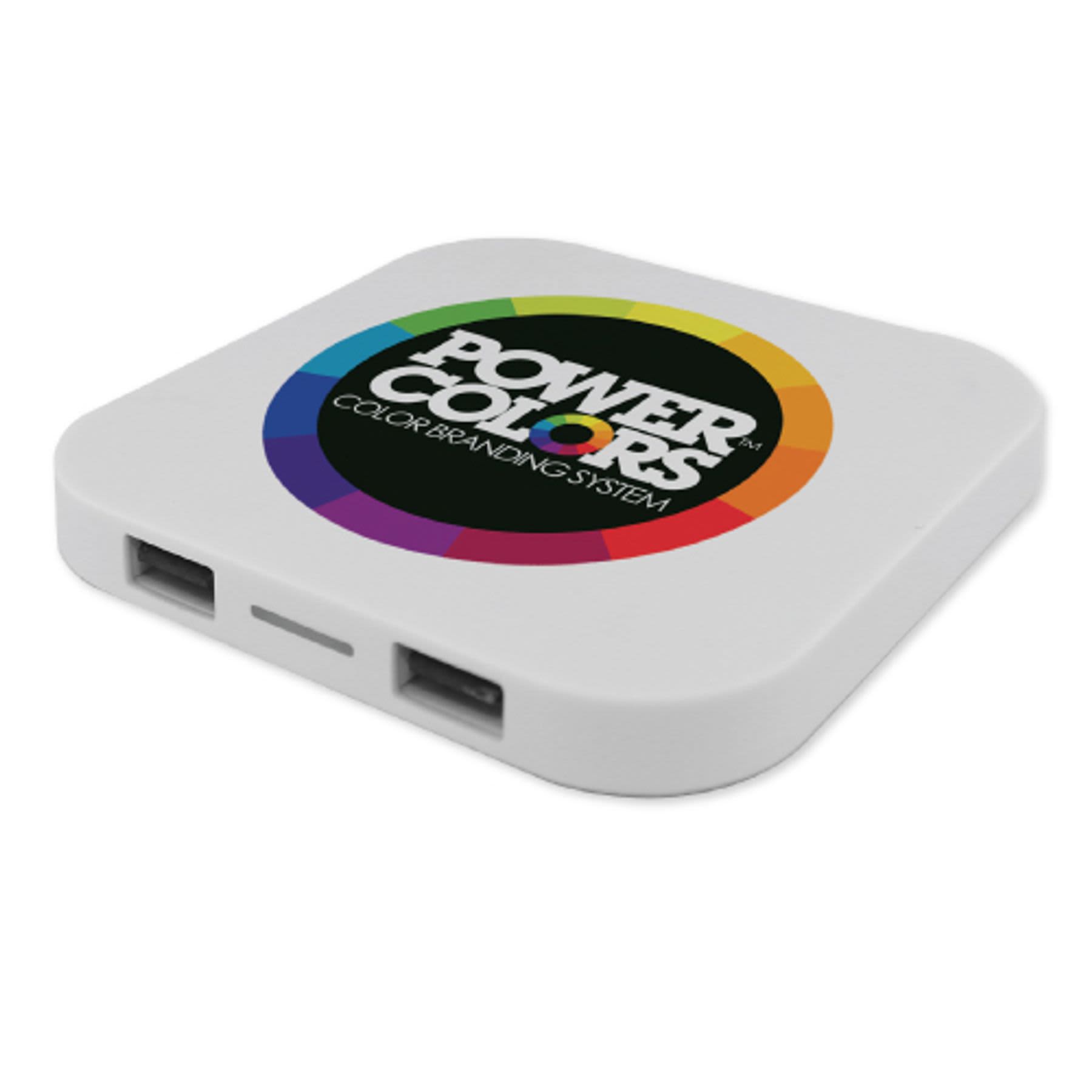 A square-shaped white wireless charger featuring a circular multicolour logo. Two USB ports visible on the side. Square shaped Wireless Charger - Image 1